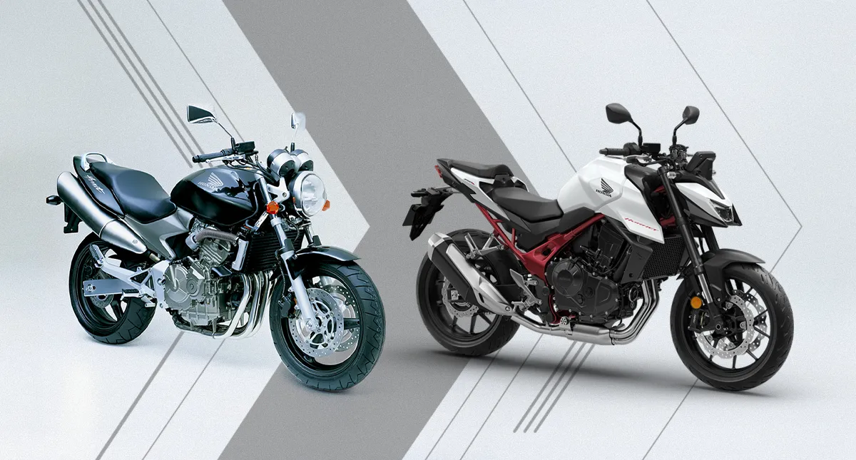 Moto Honda branca e preta visão direita