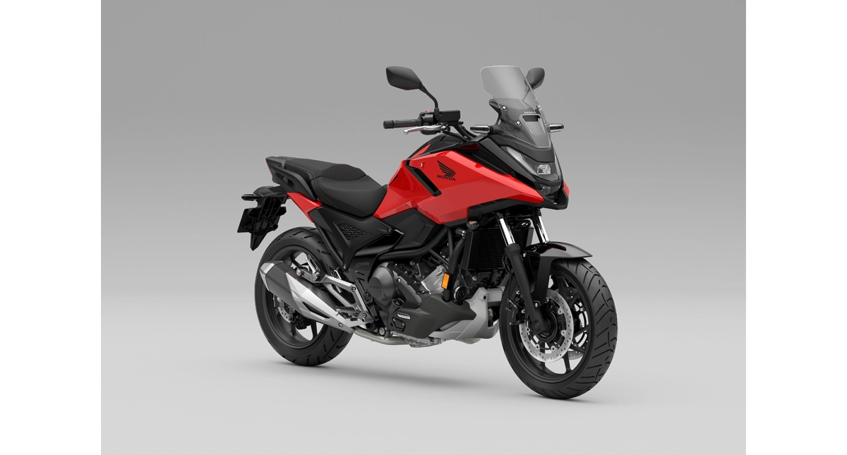 Moto Honda vermelha vista do lado esquerdo