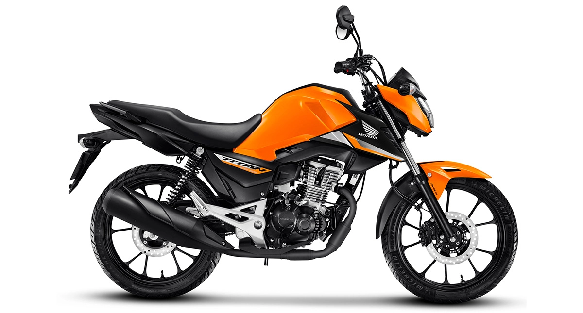 Lateral da nova motocicleta Honda CG 160 Titan em laranja e preto