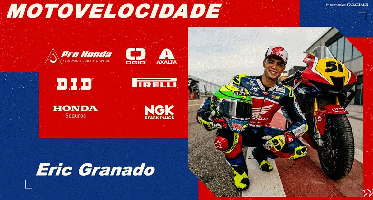piloto Eric Granado ao lado de sua motocicleta no campeonato de motovelocidade