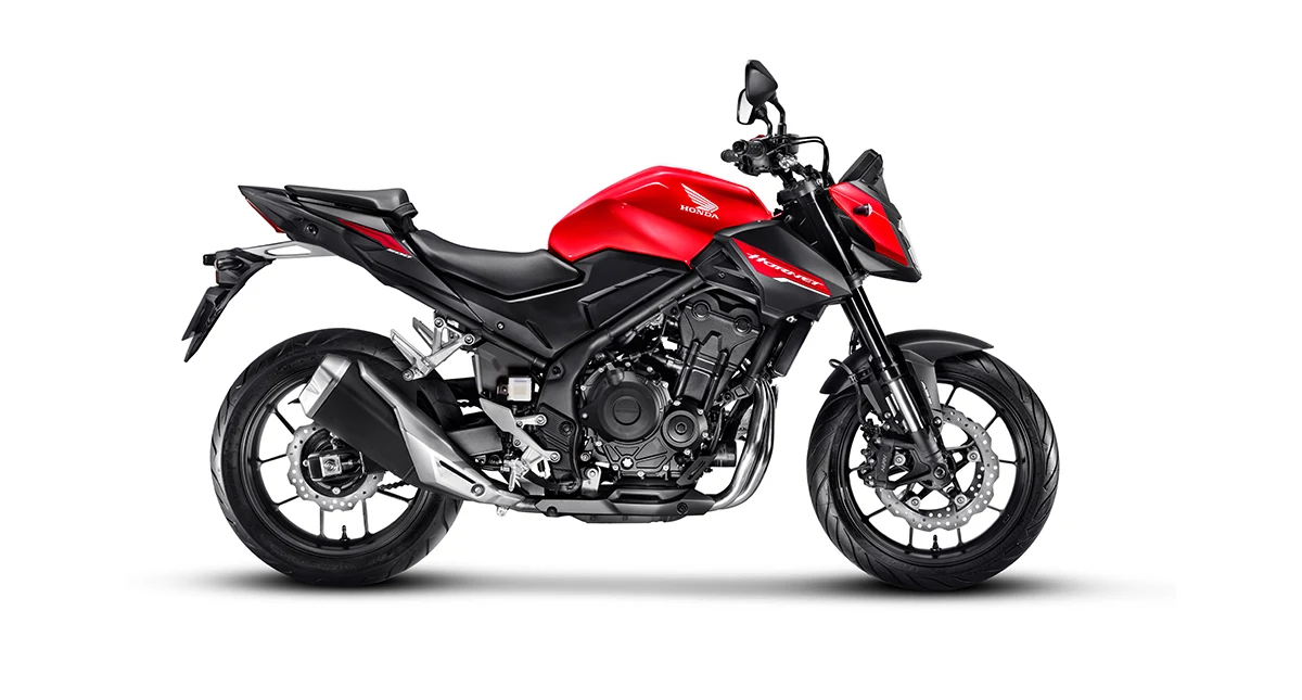 moto honda hornet vermelha posição lateral