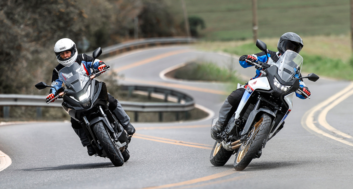Honda Transalp e NC750X fazendo curva